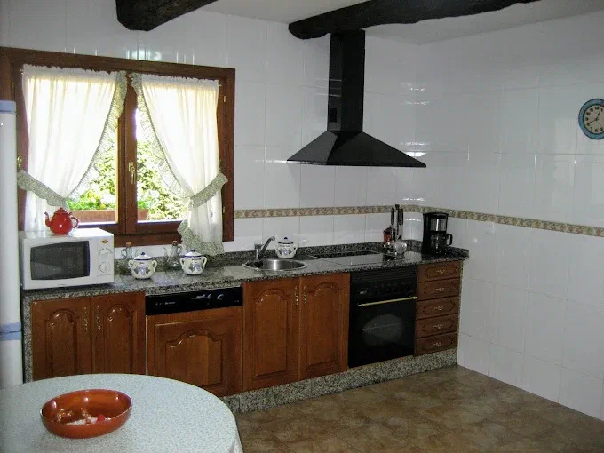 Cocina equipada con campana